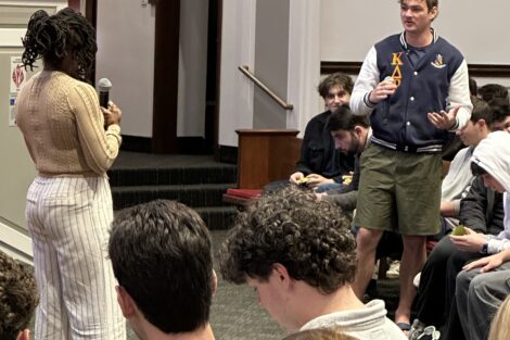 Dr. ShirDonna Lawrence speaking with Tyler Beck, President of Kappa Delta Rho
