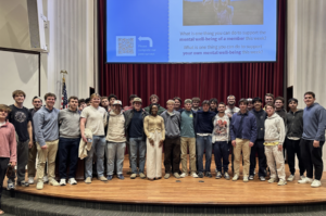 Members of Delta Kappa Epsilon with Dr. ShirDonna Lawrence